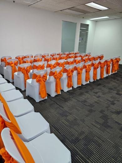 Plastic Chair White Cover with Orange Ribbon - Setup event photo 2, 2024